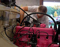 Russ Dushin bolts in the steering linkage